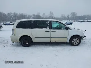 2009 Dodge Grand Caravan with VIN 2D8HN11E19R703857, listed as a IAAI auction lot 41195565 with 199,776 mi miles and . Bid and sale history available at DreamBid. Image 14.