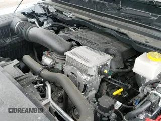 2024 Ram 1500 Big Horn z VIN 1C6SRFFT1RN124465, wystawiony jako IAAI lot #41839097 z przebiegiem 24 106 mil mil oraz . Historia ofert i sprzedaży dostępna na DreamBid. Obrazek 20.