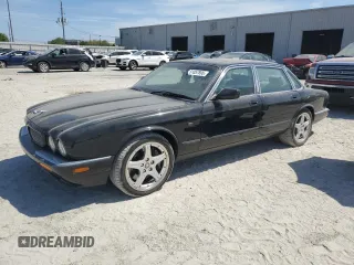 2003 Jaguar XJ with VIN SAJDA15B83MF58887, listed as a Copart auction lot 51057895 with 189,770 mi miles and Clean title. Bid and sale history available at DreamBid. Image 1.