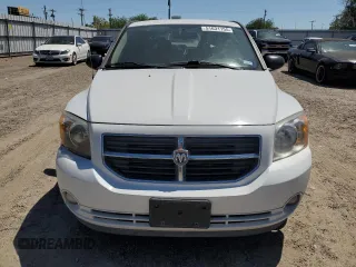 2011 Dodge Caliber Mainstreet with VIN 1B3CB3HA3BD123598, listed as a Copart auction lot 51631155 with 148,317 mi miles and Salvage Title. Bid and sale history available at carsss.com. Image 5.