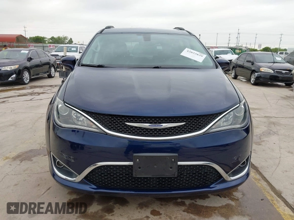 2017 Chrysler Pacifica Touring L with VIN 2C4RC1BG2HR526422, listed as a IAAI auction lot 42032839 with 180,710 mi miles and . Bid and sale history available at DreamBid. Image 12.