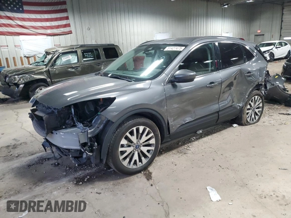 2021 Ford Escape Titanium Hybrid z VIN 1FMCU9DZ8MUA56194, wystawiony jako Copart lot #51427475 z przebiegiem 40 471 mil mil oraz Szkoda całkowita • Salvage title. Historia ofert i sprzedaży dostępna na DreamBid. Obrazek 1.