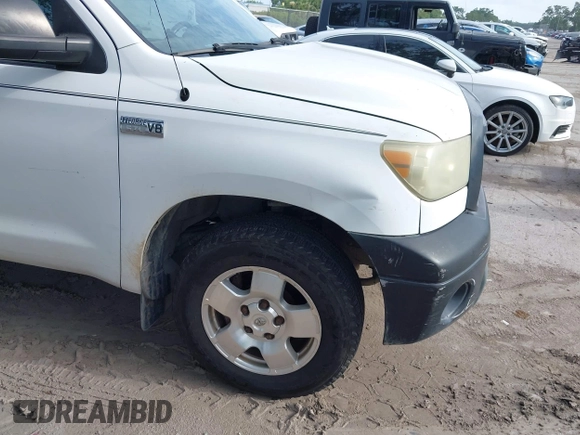 2010 Toyota Tundra with VIN 5TFLU5F10AX022832, listed as a IAAI auction lot 42504366 with 223,392 mi miles and . Bid and sale history available at DreamBid. Image 17.