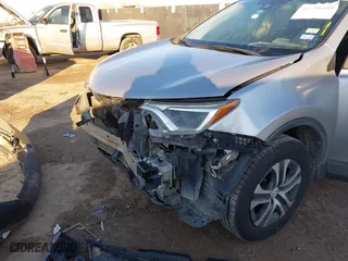 2017 Toyota RAV4 LE with VIN 2T3ZFREV3HW325229, listed as a IAAI auction lot 41290488 with 156,243 mi miles. Bid and sale history available at carsss.com. Image 6.