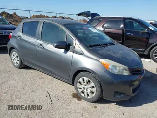 2012 Toyota Yaris L with VIN JTDKTUD32CD535940, listed as a IAAI auction lot 41767488 with 139,972 mi miles. Bid and sale history available at carsss.com. Image 1.