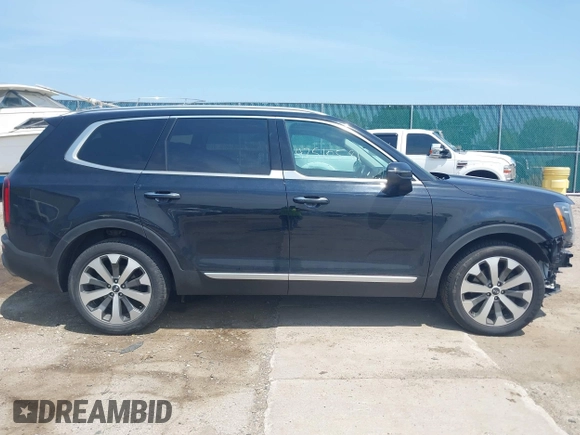 2021 Kia Telluride S with VIN 5XYP64HC9MG177780, listed as a IAAI auction lot 42510581 with 55,900 mi miles and . Bid and sale history available at DreamBid. Image 14.