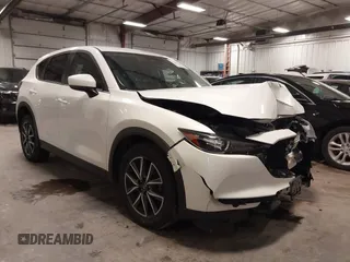 2018 Mazda CX-5 Touring with VIN JM3KFBCM9J0412864, listed as a IAAI auction lot 41320417 with 110,134 mi miles and . Bid and sale history available at DreamBid. Image 1.