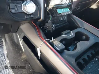2019 Ram 1500 Rebel z VIN 1C6SRFLT2KN900600, wystawiony jako IAAI lot #41307832 z przebiegiem 74 481 mil mil oraz . Historia ofert i sprzedaży dostępna na DreamBid. Obrazek 11.