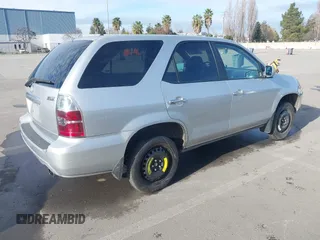 2004 Acura MDX with VIN 2HNYD18294H545516, listed as a IAAI auction lot 41620110 with 220,246 mi miles. Bid and sale history available at carsss.com. Image 4.