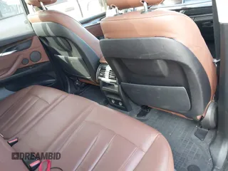 2014 BMW X5 xDrive35d with VIN 5UXKS4C5XE0J95127, listed as a IAAI auction lot 41755847 with 145,539 mi miles. Bid and sale history available at carsss.com. Image 8.