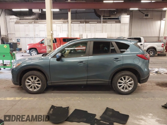 2016 Mazda CX-5 Touring z VIN JM3KE4CY2G0839202, wystawiony jako IAAI lot #41901207 z przebiegiem 65 449 mil mil oraz . Historia ofert i sprzedaży dostępna na DreamBid. Obrazek 15.