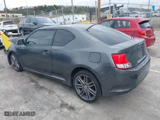 2013 Scion tC with VIN JTKJF5C74D3052964, listed as a IAAI auction lot 41804627 with 244,013 mi miles. Bid and sale history available at carsss.com. Image 3.