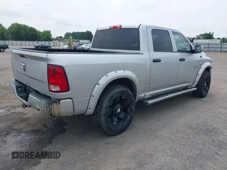 2014 Ram 1500 Express with VIN 3C6RR6KT9EG219721, listed as a IAAI auction lot 42385648 with 168,233 mi miles and . Bid and sale history available at DreamBid. Image 4.
