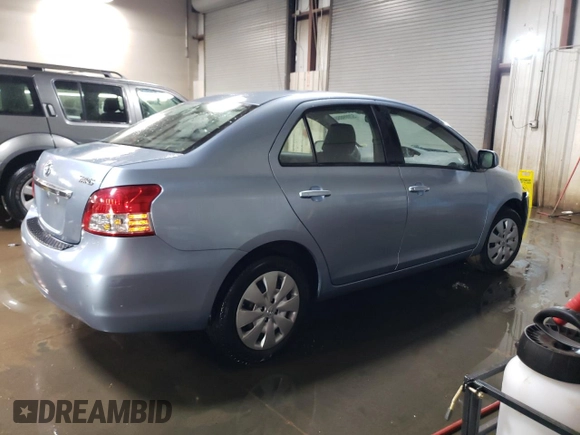 2010 Toyota Yaris with VIN JTDBT4K35A4064446, listed as a Copart auction lot 52099855 with 61,934 mi miles and Salvage Title. Bid and sale history available at carsss.com. Image 3.