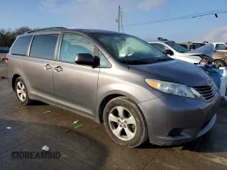 2014 Toyota Sienna LE AAS with VIN 5TDKK3DC8ES517561, listed as a Copart auction lot 86393114 with 212,231 mi miles and Clean Title. Bid and sale history available at DreamBid. Image 4.