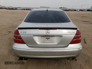 2005 Mercedes-Benz E-Class 5.5L AMG with VIN WDBUF76J05A730404, listed as a Copart auction lot 78168554 with 154,164 mi miles and Clean Title. Bid and sale history available at carsss.com. Image 6.