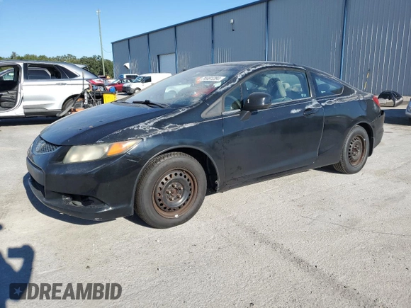 2012 Honda Civic Cpe LX with VIN 2HGFG3B52CH565934, listed as a Copart auction lot 74461284 with 259,290 mi miles and Salvage Title. Bid and sale history available at carsss.com. Image 1.