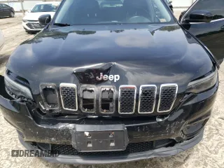 2019 Jeep Cherokee Latitude Plus with VIN 1C4PJMLB7KD101158, listed as a Copart auction lot 58246115 with 144,807 mi miles and Salvage title. Bid and sale history available at DreamBid. Image 12.