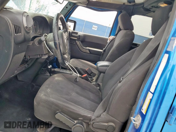 2015 Jeep Wrangler Unlimited Sport с VIN 1C4HJWDG2FL528687, выставлен на аукционе Copart как лот 59174625 с пробегом 87 285 миль миль и На запчасти • Non repairable. История ставок и продаж доступна на DreamBid. Изображение 7.