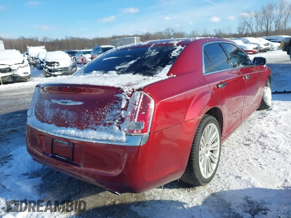 2014 Chrysler 300 with VIN 2C3CCAET9EH104233, listed as a IAAI auction lot 41581466 with 127,772 mi miles. Bid and sale history available at carsss.com. Image 4.