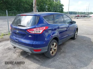2014 Ford Escape SE z VIN 1FMCU9G91EUA06332, wystawiony jako IAAI lot #42727426 z przebiegiem 173 713 mil mil oraz . Historia ofert i sprzedaży dostępna na DreamBid. Obrazek 4.