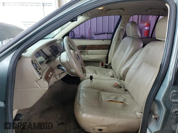 2005 Mercury Grand Marquis LS Premium with VIN 2MEFM75W05X615367, listed as a Copart auction lot 52590275 with 203,052 mi miles and Salvage Title. Bid and sale history available at carsss.com. Image 7.