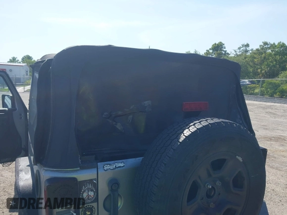 2014 Jeep Wrangler Sport with VIN 1C4AJWAG0EL126459, listed as a IAAI auction lot 42286803 with 179,025 mi miles and . Bid and sale history available at DreamBid. Image 6.