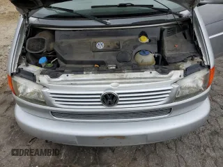 2002 Volkswagen EuroVan с VIN WV2KB47022H065941, выставлен на аукционе Copart как лот 79238234 с пробегом Не указан миль и Чистый • Clean title. История ставок и продаж доступна на DreamBid. Изображение 11.