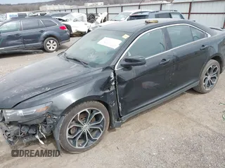 2013 Ford Taurus SHO z VIN 1FAHP2KT6DG174191, wystawiony jako IAAI lot #41752293 z przebiegiem 147 607 mil mil oraz . Historia ofert i sprzedaży dostępna na DreamBid. Obrazek 18.