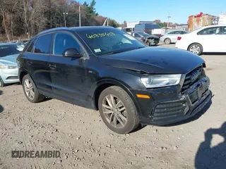 2018 Audi Q3 Premium with VIN WA1ECCFS6JR024513, listed as a IAAI auction lot 40835409 with 102,547 mi miles. Bid and sale history available at carsss.com. Image 1.