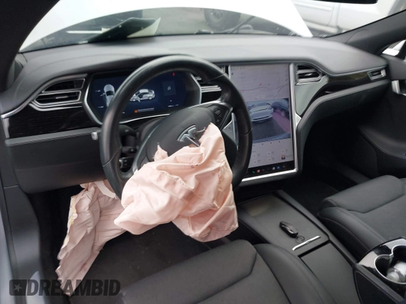 2017 Tesla Model S 100D with VIN 5YJSA1E24HF193563, listed as a IAAI auction lot 42120120 with 60,391 mi miles and . Bid and sale history available at DreamBid. Image 22.
