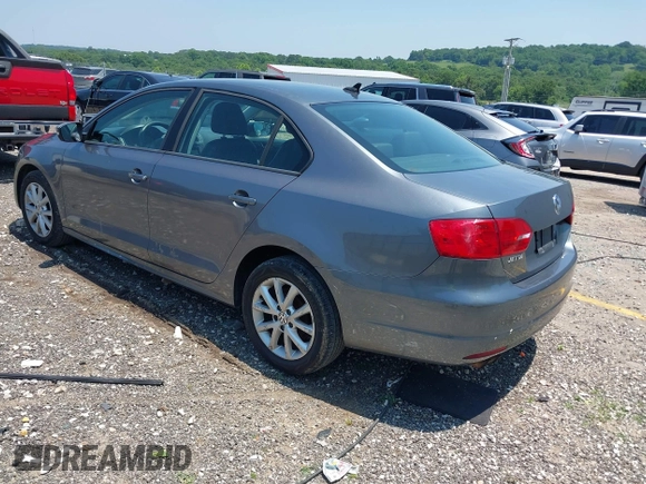 2011 Volkswagen Jetta SE with VIN 3VWDZ7AJ0BM012959, listed as a IAAI auction lot 42455475 with 128,220 mi miles and . Bid and sale history available at DreamBid. Image 3.