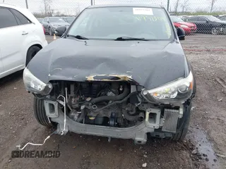 2018 Mitsubishi Outlander Sport ES 2.0 with VIN JA4AR3AU3JU019868, listed as a IAAI auction lot 41957304 with 87,305 mi miles. Bid and sale history available at carsss.com. Image 13.