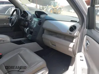 2011 Honda Pilot Touring z VIN 5FNYF3H90BB006634, wystawiony jako IAAI lot #42388390 z przebiegiem 218 475 mil mil oraz . Historia ofert i sprzedaży dostępna na DreamBid. Obrazek 5.