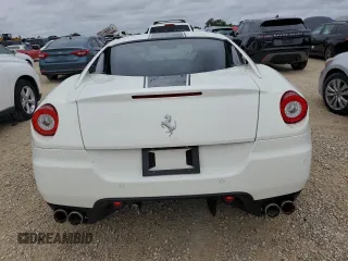 2010 Ferrari 599 z VIN ZFF60FCA0A0173683, wystawiony jako Copart lot #74913514 z przebiegiem Nie podano mil oraz Szkody całkowita. Historia ofert i sprzedaży dostępna na DreamBid. Obrazek 6.