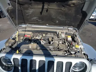 2023 Jeep Wrangler Willys with VIN 1C4HJXDG3PW577807, listed as a IAAI auction lot 42323674 with 28,808 mi miles and . Bid and sale history available at DreamBid. Image 10.