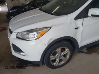 2013 Ford Escape SE with VIN 1FMCU9GX1DUC15356, listed as a IAAI auction lot 42667149 with 170,554 mi miles and . Bid and sale history available at DreamBid. Image 6.