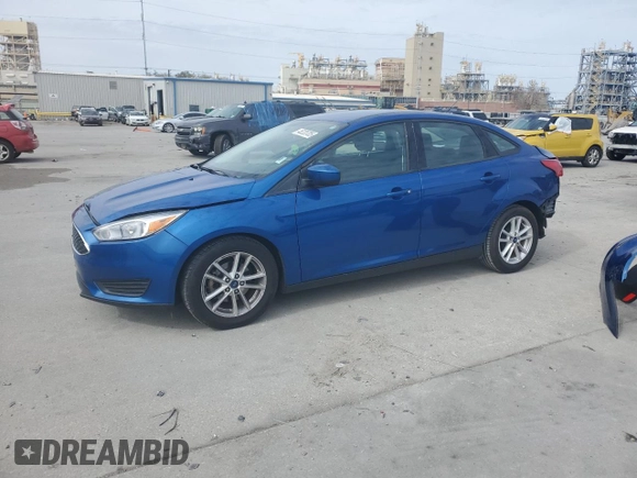 2018 Ford Focus SE z VIN 1FADP3F22JL328761, wystawiony jako Copart lot #45220705 z przebiegiem 71 639 mil mil oraz Szkoda całkowita • Salvage title. Historia ofert i sprzedaży dostępna na DreamBid. Obrazek 1.