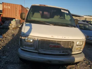 2000 GMC Savana z VIN 1GTFG25M5Y1902825, wystawiony jako Copart lot #81948164 z przebiegiem 275 963 mil mil oraz Czysty tytuł • Clean title. Historia ofert i sprzedaży dostępna na DreamBid. Obrazek 5.