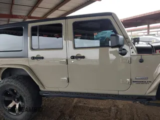 2017 Jeep Wrangler Unlimited Rubicon with VIN 1C4BJWFG7HL663203, listed as a IAAI auction lot 42391999 with 63,430 mi miles and . Bid and sale history available at DreamBid. Image 14.