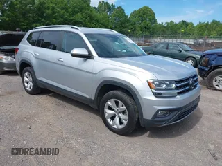 2018 Volkswagen Atlas SE z VIN 1V2DR2CAXJC521412, wystawiony jako IAAI lot #42309661 z przebiegiem 99 045 mil mil oraz . Historia ofert i sprzedaży dostępna na DreamBid. Obrazek 1.
