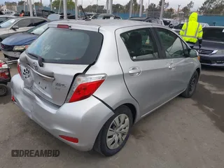 2012 Toyota Yaris L with VIN JTDKTUD30CD525956, listed as a IAAI auction lot 42057788 with 191,307 mi miles. Bid and sale history available at carsss.com. Image 4.