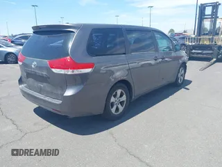 2012 Toyota Sienna with VIN 5TDZK3DC9CS261944, listed as a IAAI auction lot 41885359 with 184,918 mi miles. Bid and sale history available at carsss.com. Image 4.