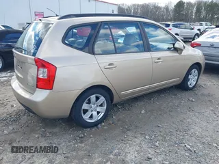 2008 Kia Rondo EX with VIN KNAFG526387162838, listed as a IAAI auction lot 41401947 with 187,062 mi miles. Bid and sale history available at carsss.com. Image 4.