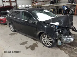 2014 Volkswagen Jetta SportWagen TDI w/Sunroof & Nav with VIN 3VWPL7AJ6EM626501, listed as a IAAI auction lot 41287338 with 122,255 mi miles. Bid and sale history available at carsss.com. Image 1.