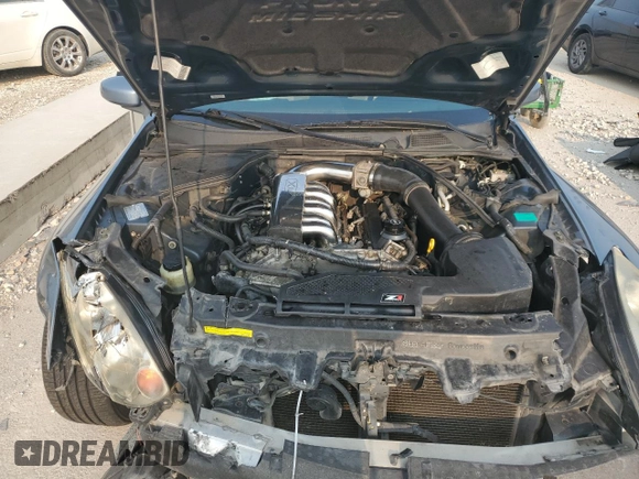 2005 Infiniti G35 Coupe with VIN JNKCV54E85M403143, listed as a Copart auction lot 64476634 with 206,226 mi miles and Salvage Title. Bid and sale history available at carsss.com. Image 12.