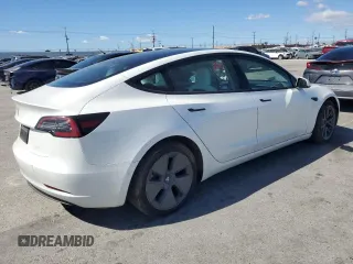 2022 Tesla Model 3 with VIN 5YJ3E1EAXNF203914, listed as a Copart auction lot 46982935 with 70,766 mi miles and Salvage Title. Bid and sale history available at DreamBid. Image 3.