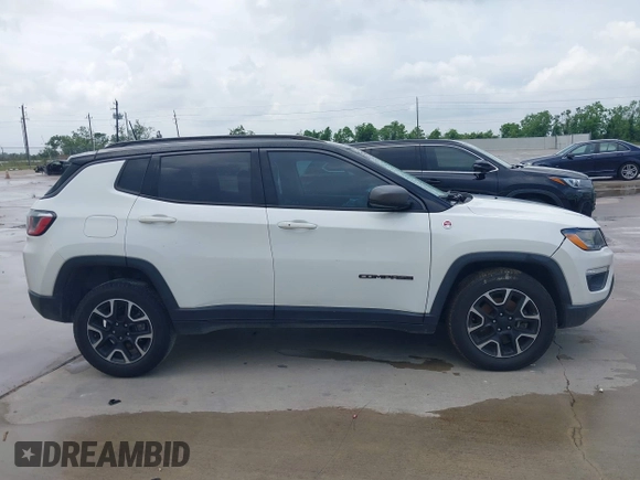 2020 Jeep Compass Trailhawk with VIN 3C4NJDDB3LT118928, listed as a IAAI auction lot 42128120 with 95,477 mi miles and . Bid and sale history available at DreamBid. Image 13.