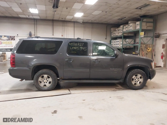 2010 Chevrolet Suburban LT with VIN 1GNUKJE36AR139025, listed as a IAAI auction lot 41311327 with 201,955 mi miles. Bid and sale history available at carsss.com. Image 13.