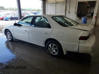 1999 Toyota Camry LE z VIN JT2BG22K3X0317823, wystawiony jako Copart lot #58203965 z przebiegiem 167 587 mil mil oraz Szkoda całkowita • Salvage title. Historia ofert i sprzedaży dostępna na DreamBid. Obrazek 2.